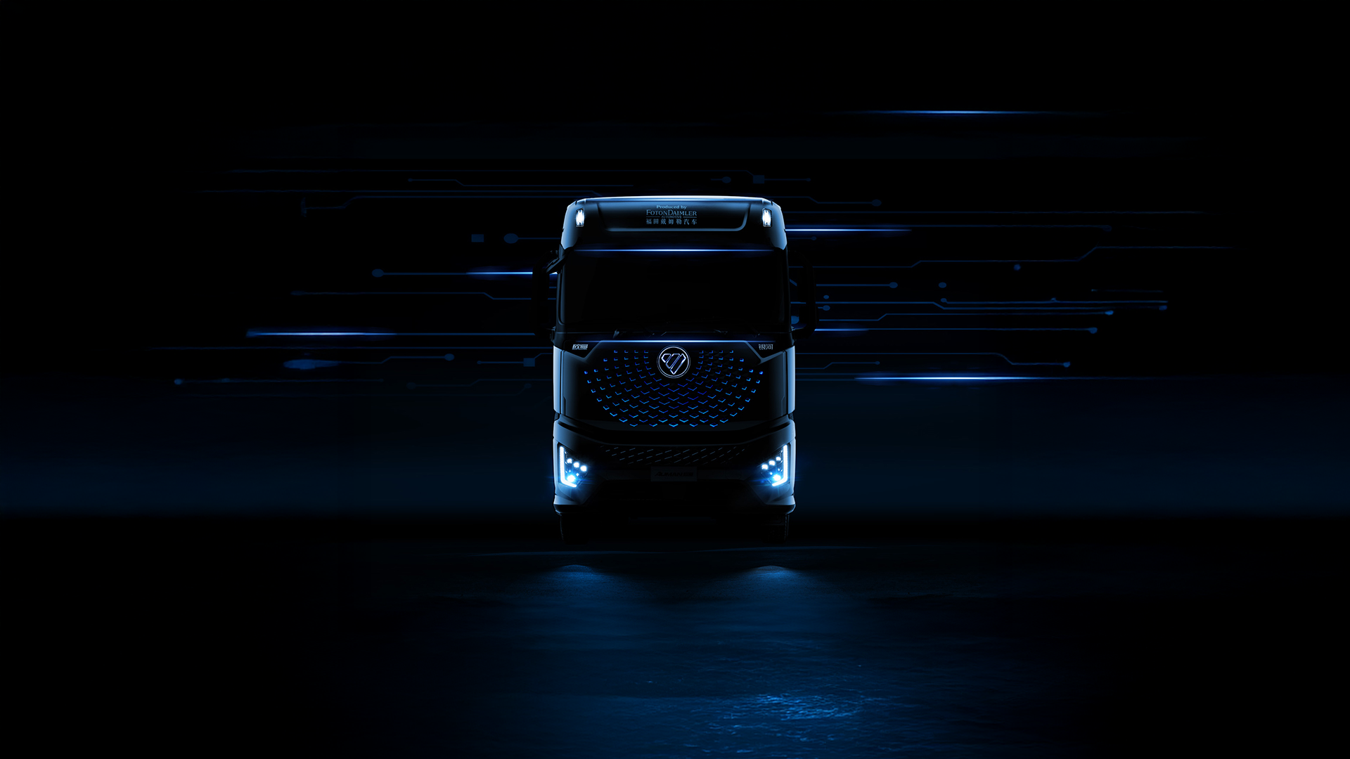 FOTON commercial truck front lit dramatically against a dark background