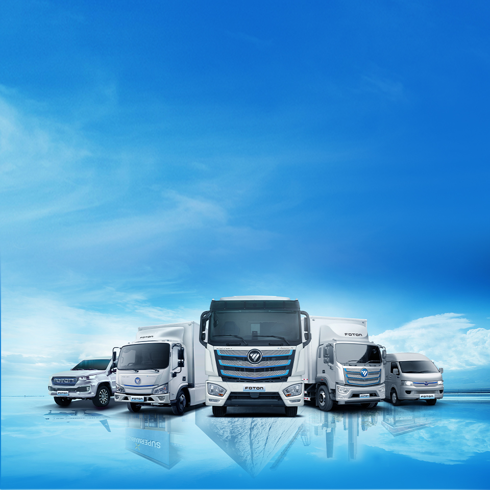 Five FOTON commercial vehicles lined up outdoors under a blue sky