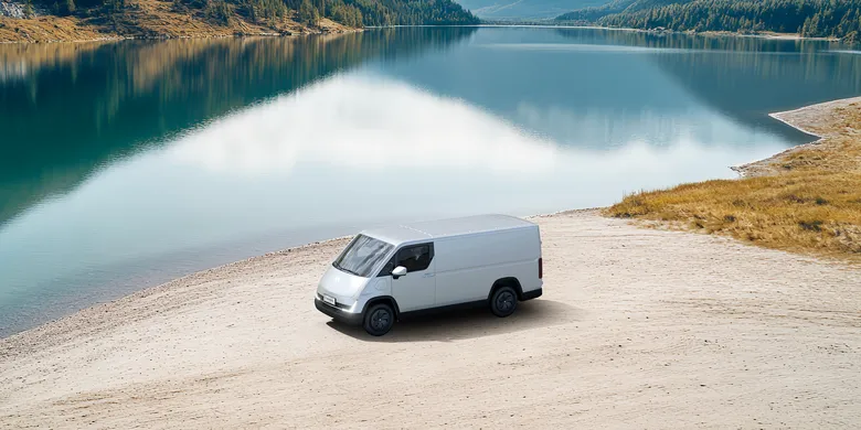White Cavan C1 parked beside a still lake