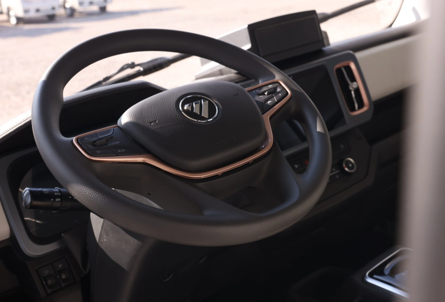 E Miler front seats and centre console at dusk