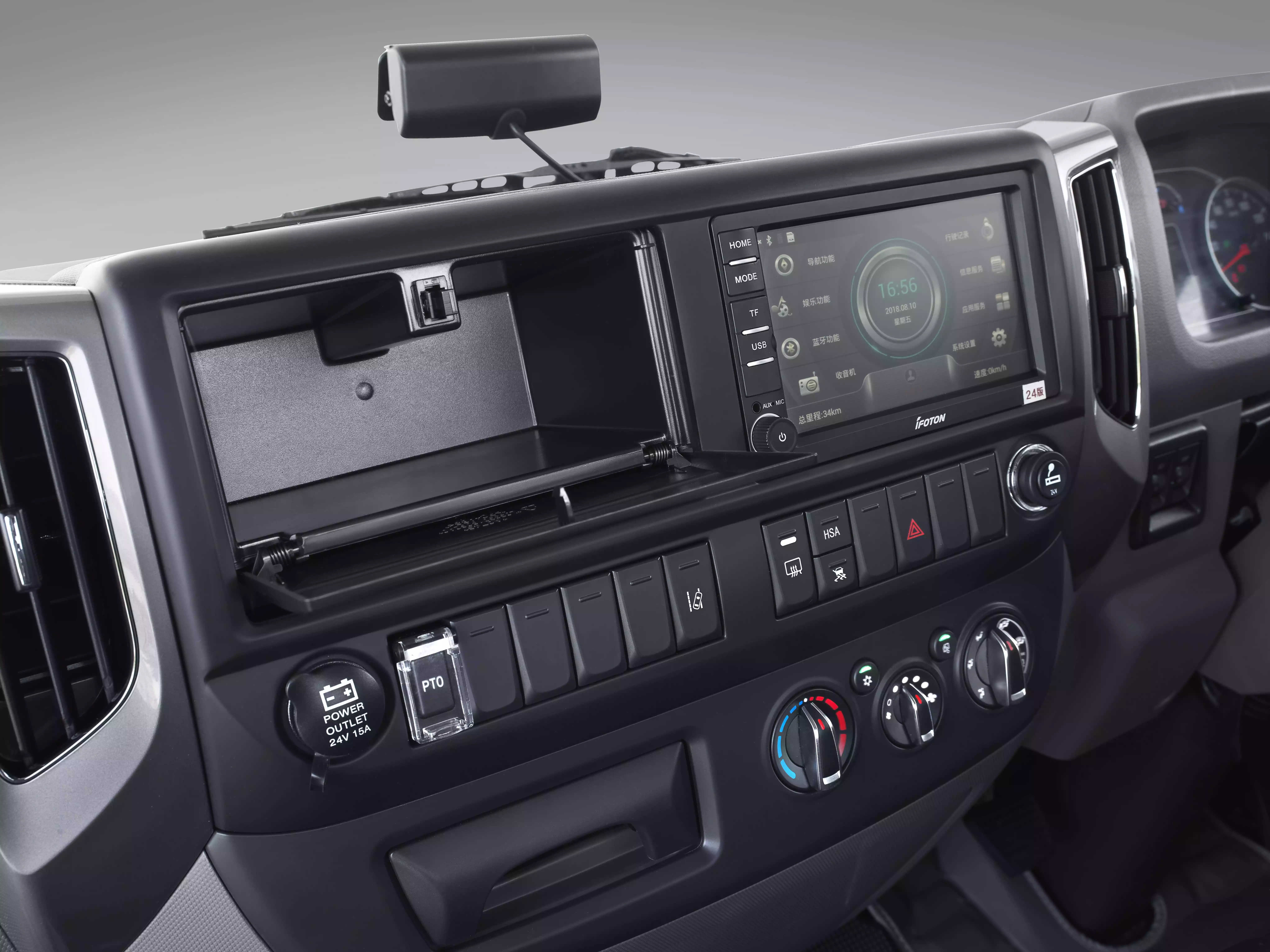 Aumark S front seats and centre console at dusk