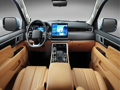 Tunland V9 front seats and centre console at dusk