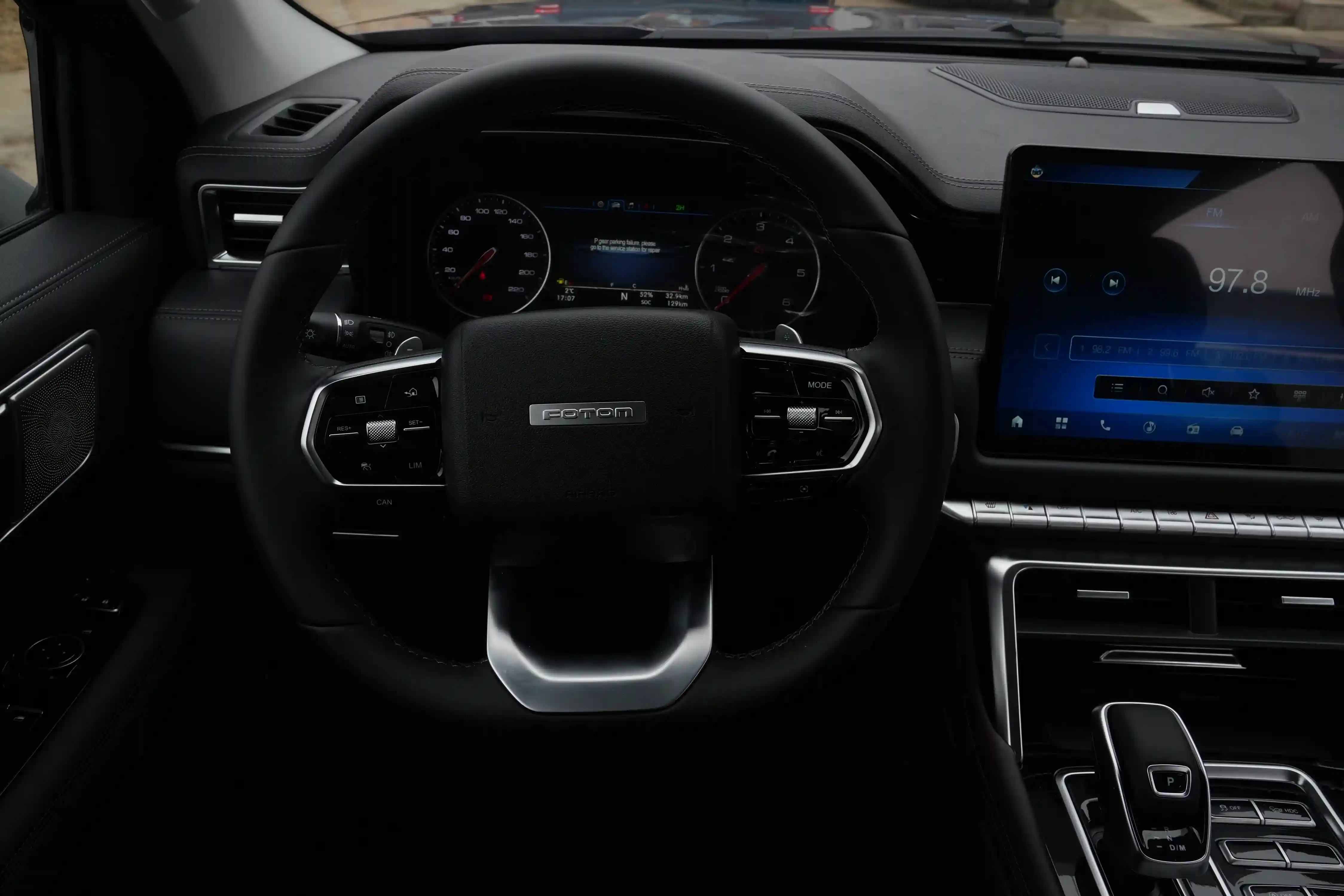 Tunland V7 front seats and centre console at dusk